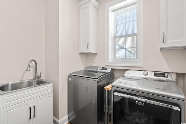 609 Mccown Dr, Conway, SC 29526 - laundry room featuring separate washer and dryer and cabinet space