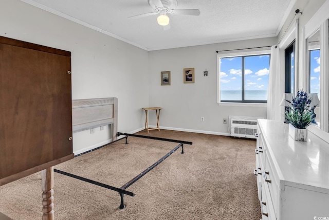 5601 N Ocean Blvd Unit A309, Myrtle Beach, SC 29577 - carpeted bedroom with ornamental molding, ceiling fan, a textured ceiling, a wall mounted air conditioner, and a water view