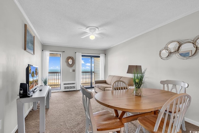 5601 N Ocean Blvd Unit A309, Myrtle Beach, SC 29577 - dining space featuring carpet flooring, crown molding, a ceiling fan, and a textured ceiling