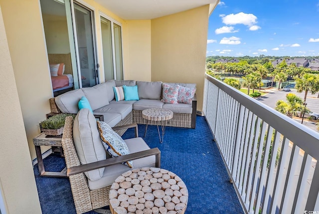 139 S Dunes Dr Unit 304, Pawleys Island, SC 29585 - balcony with outdoor lounge area