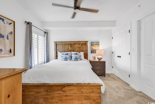 139 S Dunes Dr Unit 304, Pawleys Island, SC 29585 - bedroom featuring light carpet, a ceiling fan, and a closet