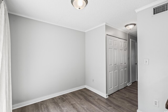4115 Little River Rd Unit 1-E, Myrtle Beach, SC 29577 - spare room with wood finished floors and ornamental molding