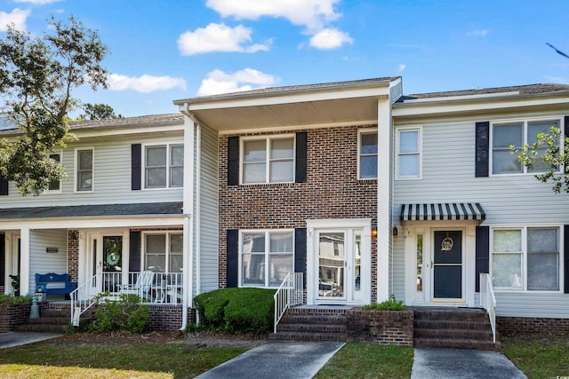 4115 Little River Rd Unit 1-E, Myrtle Beach, SC 29577 - townhome / multi-family property with covered porch