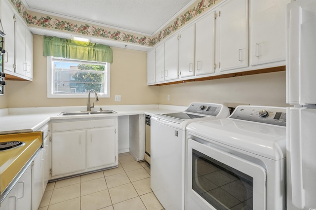 4701 N Kings Hwy Unit 8, Myrtle Beach, SC 29577 - laundry area with washing machine and clothes dryer and light tile patterned floors
