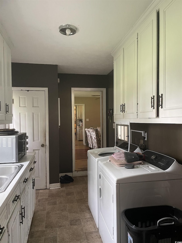 1872 Harris Short Cut Rd, Conway, SC 29526 - washroom with washing machine and clothes dryer, cabinet space, and stone finish flooring