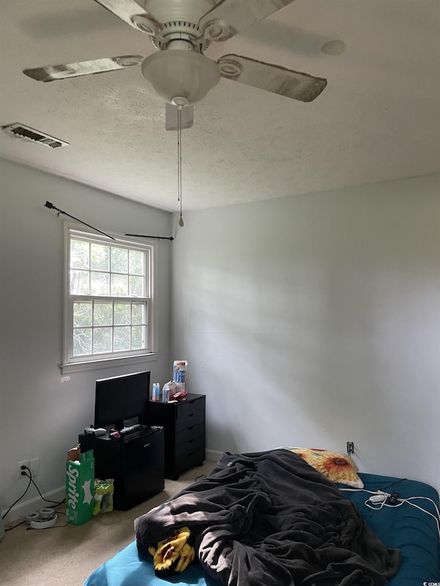 1872 Harris Short Cut Rd, Conway, SC 29526 - bedroom featuring light carpet, ceiling fan, and a textured ceiling
