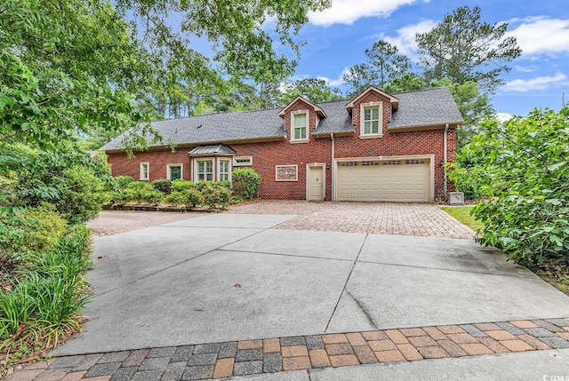 487 Trestle Way, Conway, SC 29526 - view of front of home with driveway, a garage, brick siding, and roof with shingles