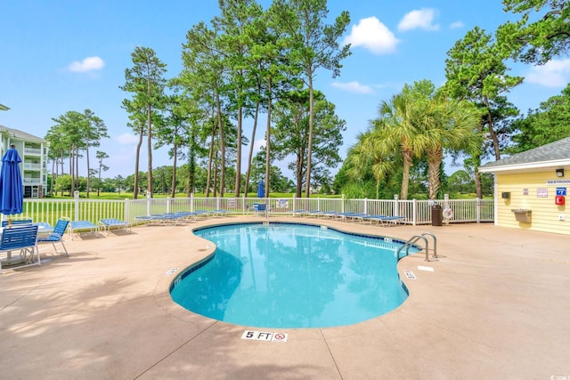 4865 Luster Leaf Cir Unit 402, Myrtle Beach, SC 29577 - community pool with a patio area