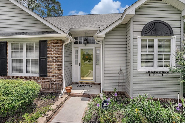 4726 Southern Trl, Myrtle Beach, SC 29579 - view of exterior entry with brick siding and a shingled roof