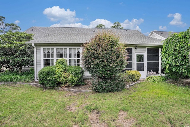 4726 Southern Trl, Myrtle Beach, SC 29579 - rear view of house featuring a lawn and a shingled roof