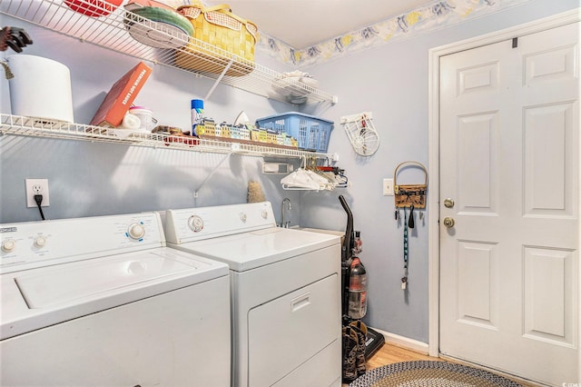 4726 Southern Trl, Myrtle Beach, SC 29579 - laundry room with separate washer and dryer and light wood-style flooring