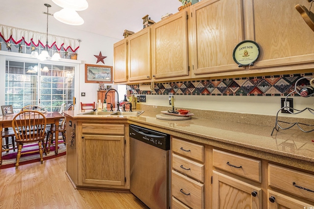 4726 Southern Trl, Myrtle Beach, SC 29579 - kitchen with stainless steel dishwasher, light wood-type flooring, and light brown cabinetry