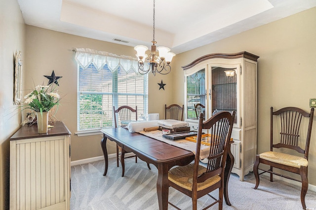 4726 Southern Trl, Myrtle Beach, SC 29579 - dining space featuring healthy amount of natural light, light colored carpet, and a tray ceiling