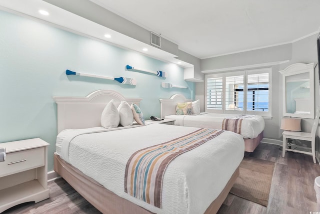 4800 S Ocean Blvd Unit 520, North Myrtle Beach, SC 29582 - bedroom featuring wood finished floors, recessed lighting, and ornamental molding