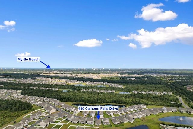490 Calhoun Falls Dr, Myrtle Beach, SC 29579 - aerial overview of property's location with nearby suburban area and a nearby body of water
