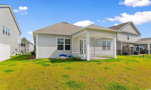 490 Calhoun Falls Dr, Myrtle Beach, SC 29579 - back of house featuring a patio area and roof with shingles