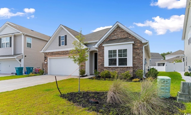 490 Calhoun Falls Dr, Myrtle Beach, SC 29579 - view of front facade with stone siding, driveway, and an attached garage