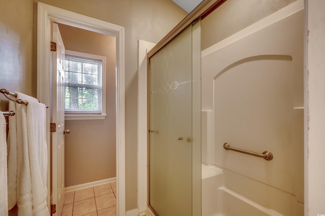 1010 Swan Lake Dr, North Myrtle Beach, SC 29582 - bathroom featuring an enclosed shower and tile patterned floors