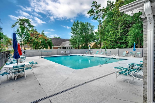 1010 Swan Lake Dr, North Myrtle Beach, SC 29582 - community pool with a patio
