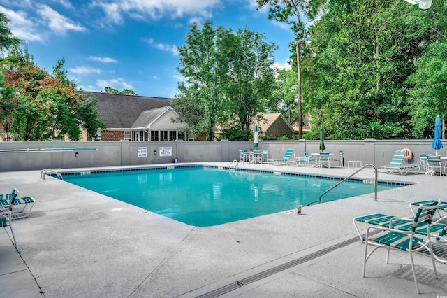 1010 Swan Lake Dr, North Myrtle Beach, SC 29582 - community pool with a patio area