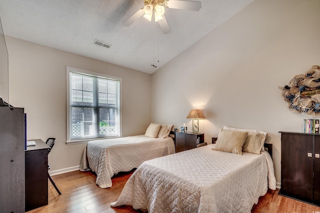 1010 Swan Lake Dr, North Myrtle Beach, SC 29582 - bedroom featuring wood finished floors, lofted ceiling, and a ceiling fan