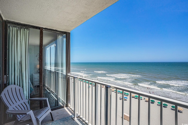 9400 Shore Dr Unit 716, Myrtle Beach, SC 29572 - balcony featuring view of water and beach