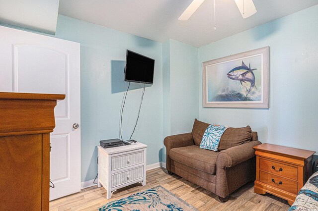 9400 Shore Dr Unit 716, Myrtle Beach, SC 29572 - living area with a ceiling fan and light wood-type flooring