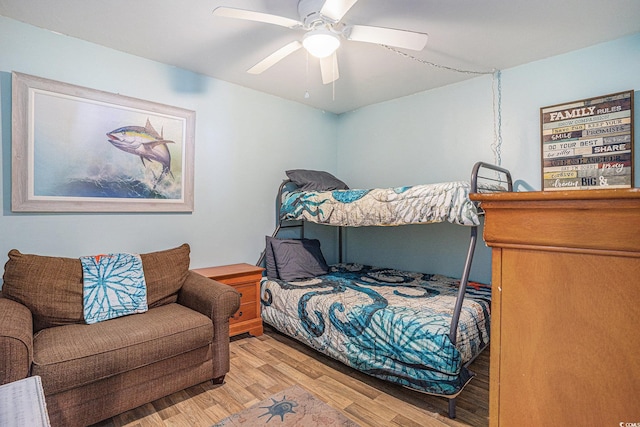 9400 Shore Dr Unit 716, Myrtle Beach, SC 29572 - bedroom with wood finished floors and ceiling fan