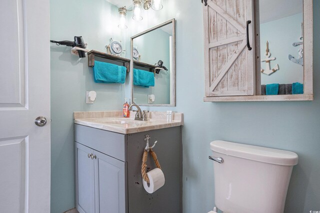 9400 Shore Dr Unit 716, Myrtle Beach, SC 29572 - bathroom featuring toilet and vanity