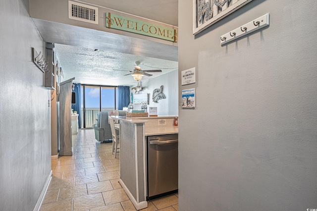 9400 Shore Dr Unit 716, Myrtle Beach, SC 29572 - hall with stone tile flooring and floor to ceiling windows