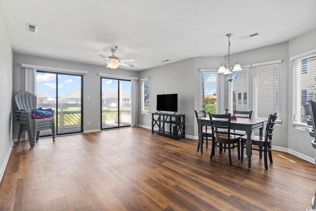 1100 Possum Trot Rd Unit F218, North Myrtle Beach, SC 29582 - dining room featuring a chandelier, dark wood finished floors, and ceiling fan