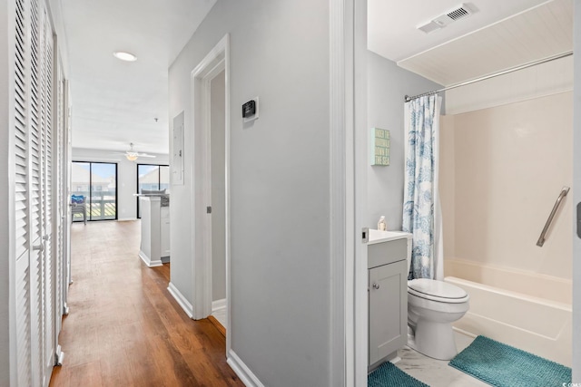 1100 Possum Trot Rd Unit F218, North Myrtle Beach, SC 29582 - hallway featuring baseboards and wood finished floors