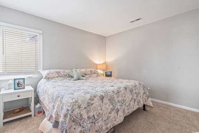 1100 Possum Trot Rd Unit F218, North Myrtle Beach, SC 29582 - carpeted bedroom featuring baseboards