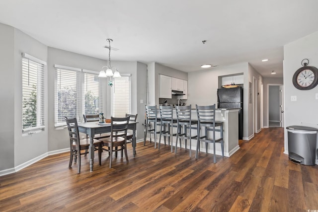 1100 Possum Trot Rd Unit F218, North Myrtle Beach, SC 29582 - dining area with dark wood-style floors, recessed lighting, and a chandelier