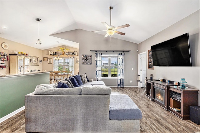 227 Palm Terrace Loop, Conway, SC 29526 - living room featuring wood finished floors, lofted ceiling, ceiling fan, and bar