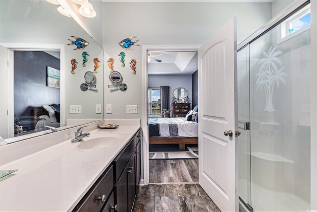 227 Palm Terrace Loop, Conway, SC 29526 - ensuite bathroom featuring vanity, a stall shower, and ceiling fan