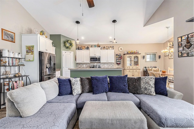 227 Palm Terrace Loop, Conway, SC 29526 - living room featuring a chandelier, vaulted ceiling, and a ceiling fan