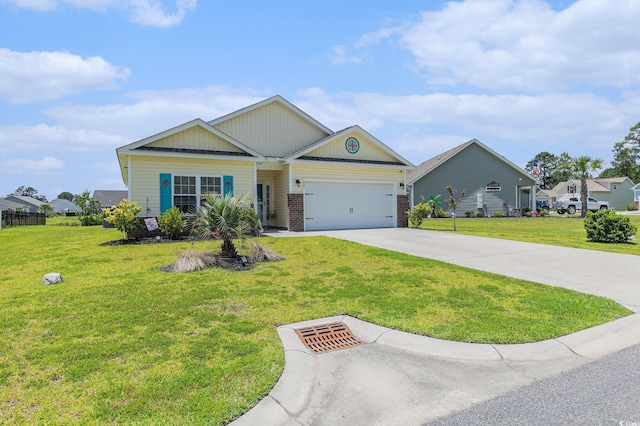 227 Palm Terrace Loop, Conway, SC 29526 - view of front of property featuring concrete driveway, an attached garage, brick siding, and a front lawn