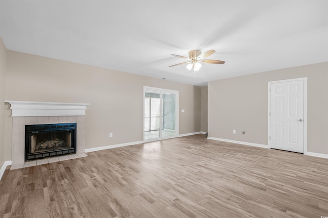 178 Beaver Pond Loop Unit 60, Pawleys Island, SC 29585 - unfurnished living room featuring a ceiling fan, light wood-style floors, and a fireplace