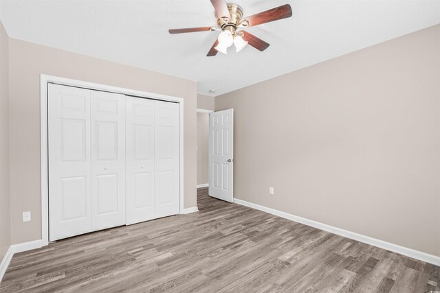 178 Beaver Pond Loop Unit 60, Pawleys Island, SC 29585 - unfurnished bedroom featuring light wood-type flooring, a closet, and ceiling fan