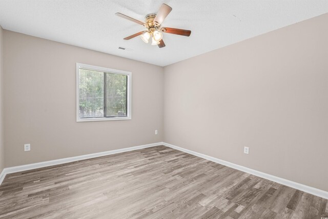 178 Beaver Pond Loop Unit 60, Pawleys Island, SC 29585 - spare room featuring light wood-style flooring and ceiling fan