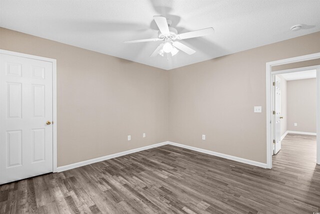 178 Beaver Pond Loop Unit 60, Pawleys Island, SC 29585 - empty room with wood finished floors, a ceiling fan, and a smoke detector