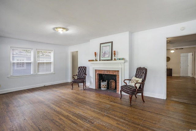 602 3rd Ave N, Myrtle Beach, SC 29577 - living area featuring a brick fireplace and wood finished floors