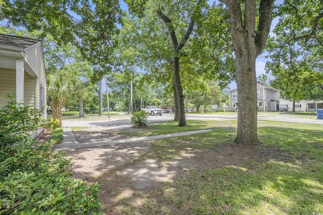 602 3rd Ave N, Myrtle Beach, SC 29577 - view of yard with decorative driveway