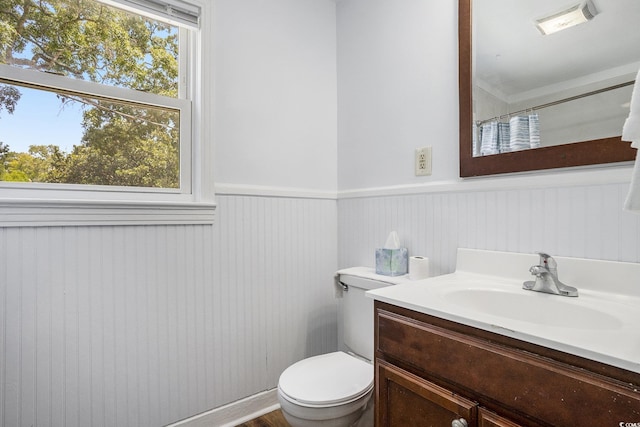 602 3rd Ave N, Myrtle Beach, SC 29577 - bathroom with vanity, wainscoting, and a shower with curtain