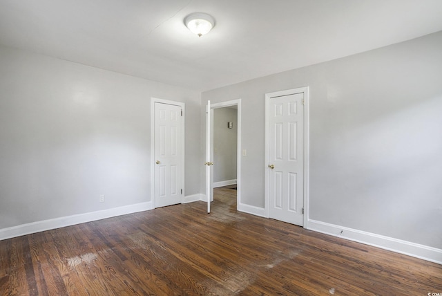 602 3rd Ave N, Myrtle Beach, SC 29577 - empty room featuring baseboards and dark wood-style flooring