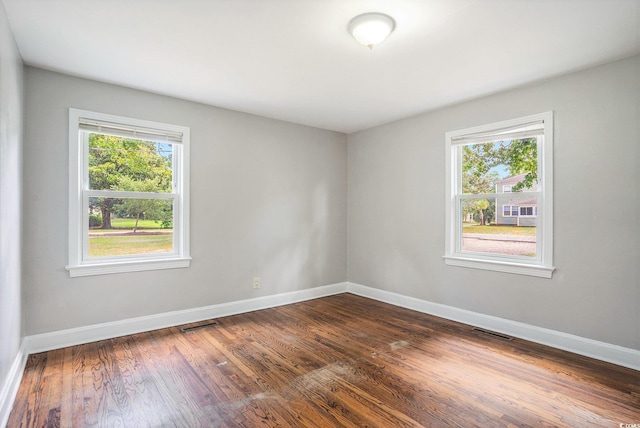 602 3rd Ave N, Myrtle Beach, SC 29577 - spare room with dark wood-style floors