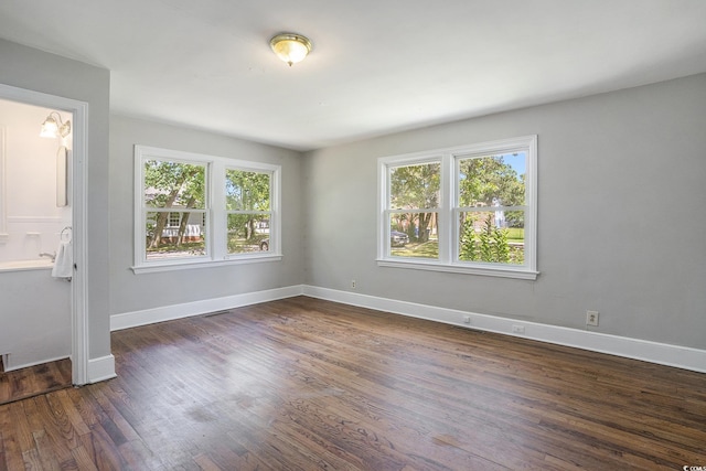 602 3rd Ave N, Myrtle Beach, SC 29577 - empty room featuring healthy amount of natural light and wood finished floors