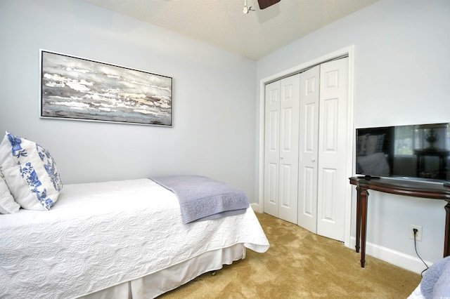 6172 Catalina Dr Unit 113, North Myrtle Beach, SC 29582 - bedroom featuring a closet, carpet flooring, and ceiling fan