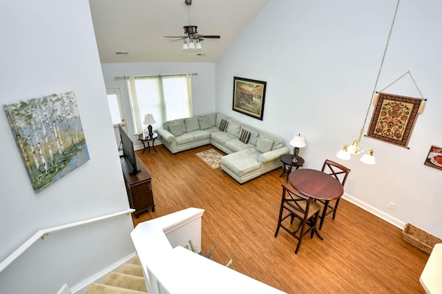 6172 Catalina Dr Unit 113, North Myrtle Beach, SC 29582 - living room featuring ceiling fan, wood finished floors, and vaulted ceiling